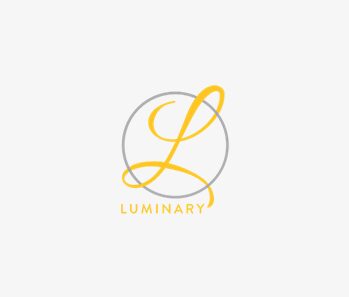A yellow and white logo of the word " luminary ".
